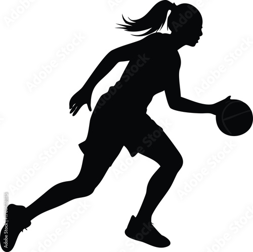 Silhouette of a female basketball player dribbling the ball in action