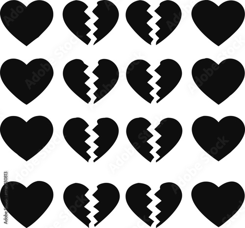 Collection of black heart shapes some whole and some broken displayed