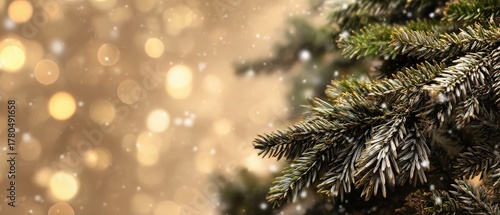 Festive Christmas tree branch with bokeh lights and falling snow, creating a magical and elegant holiday background for seasonal greetings
