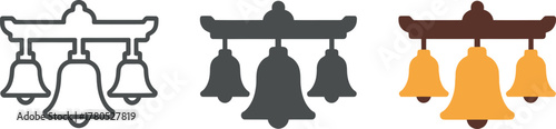 Set of decorative bells hanging from wooden beam with three different styles