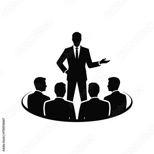 Business leader addressing a group of employees in a meeting