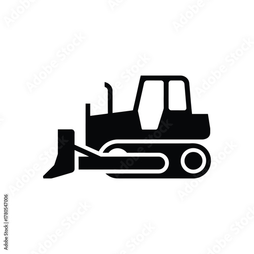 Silhouette of a construction bulldozer with a blade and tracks