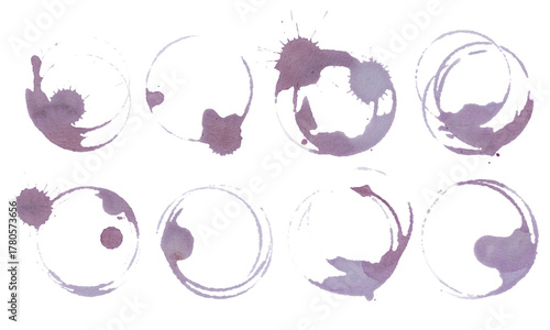 Round wine stains and glass ring marks on white background. Real red vine glass stains set. Artistic grape juice spill texture for food and drink design