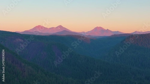 Aerial drone footage of Oregon’s Cascade Mountains and Three Sisters at sunset