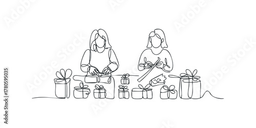 Two people wrapping gifts with ribbon and tape