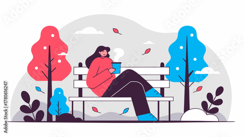 Woman enjoying a hot drink on a park bench