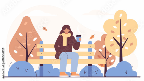 Woman enjoying coffee on park bench in autumn