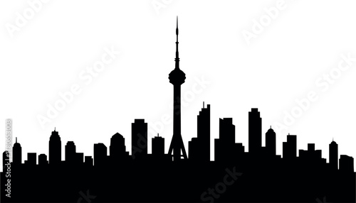 Silhouette skyline of a modern city with a prominent tower