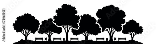 Silhouette of a park with trees and benches