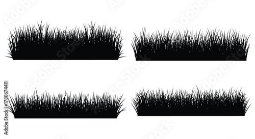 Four isolated patches of dark green grass on a white background