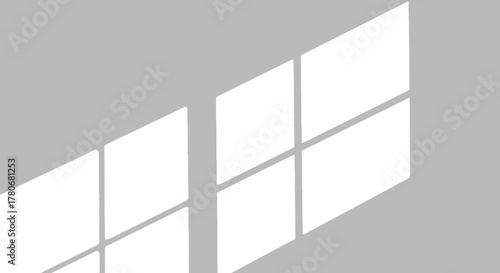Minimalist wall casting soft grid window shadows, creating a light and airy aesthetic texture for