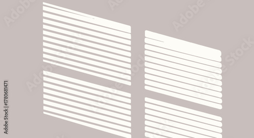 Abstract shadows cast by window blinds on a neutral-colored wall creating soft light