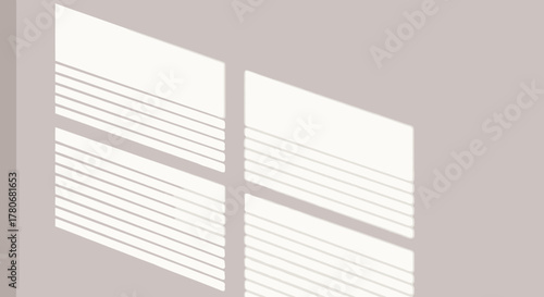Window blinds casting patterned sunlight onto a wall creating a geometric design with soft aesthetic