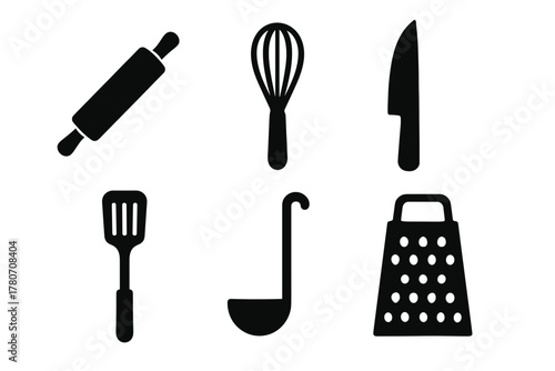 Essential kitchen utensils laid out for culinary creation