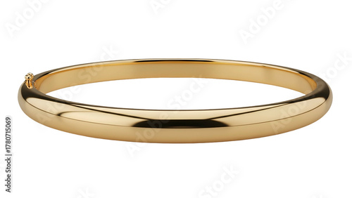 Smooth, polished gold hinged bangle displays a classic, luxurious design against a dark backdrop