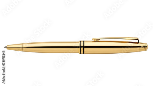 Polished golden writing instrument rests against a deep black background
