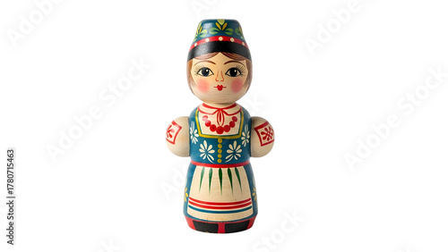 Hand-painted wooden figurine displaying traditional attire stands isolated against a dark background