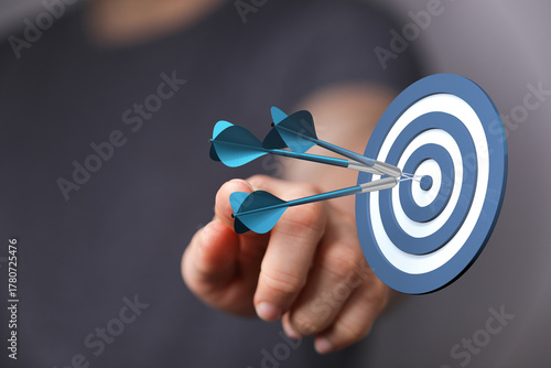 Hand pointing at target wit...