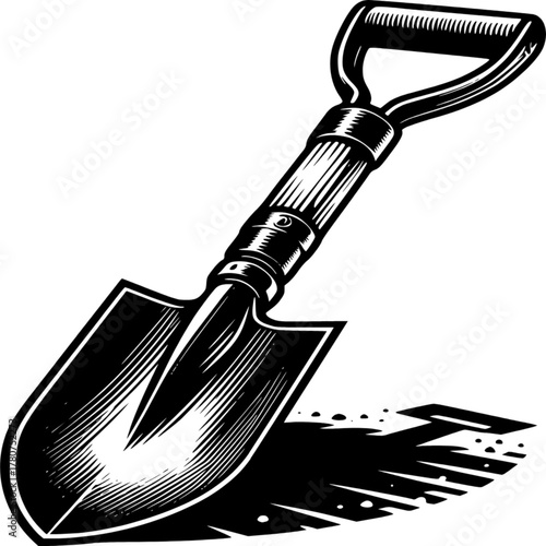 Monochrome Shovel in Silhouette: A robust shovel stands poised, its dark silhouette hinting at the promise of work, landscaping and digging. 