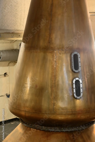 Vintage machinery (pot still) of the 1794 established Oban Distillery meant for the Highland single malt Scotch whisky production. Oban-Scotland-022