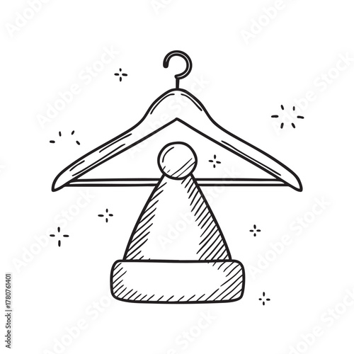 New Year hat hanging from a minimal party coat stand