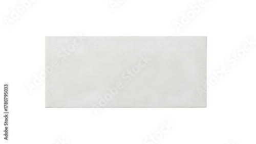 Rectangular piece of blank white material displayed against a solid black background.