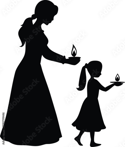 Woman lighting candle for child silhouette