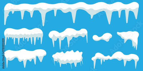 Papier peint Set of white snow caps with icicles and piles with icy texture