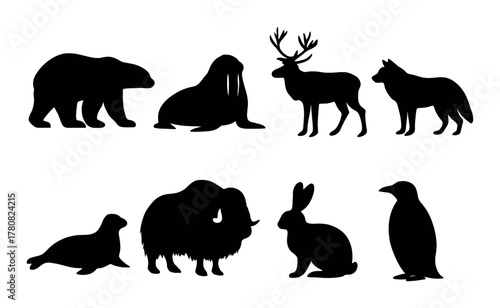 Silhouettes of arctic animals in dark background