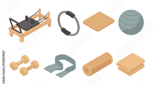 Array of fitness equipment including pilates reformer, ring, and weights