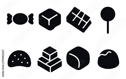 Assorted candy silhouette set on dark background