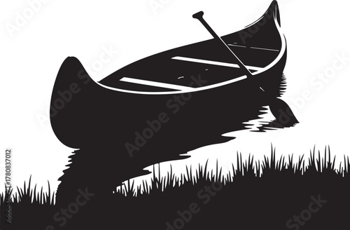 Black silhouette of a canoe with paddle on water and grass