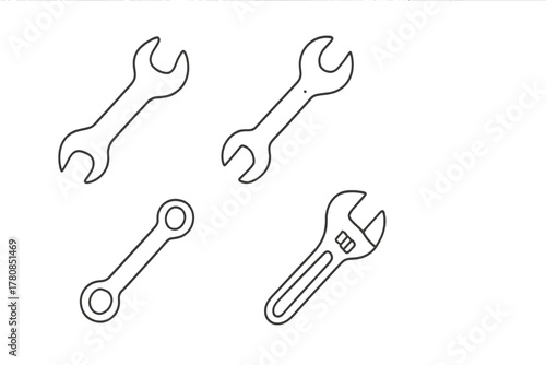 Different types of wrenches arranged on a white background showcasing various sizes and shapes for tools and repairs