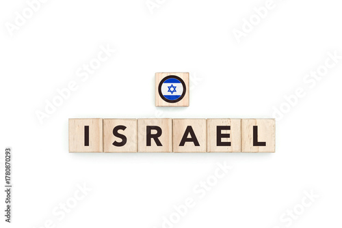 Wooden blocks bearing the name and flag of Israel. Israeli and Mediterranean and Arab Culture, national identity, travel, and geography in an advertising space design.