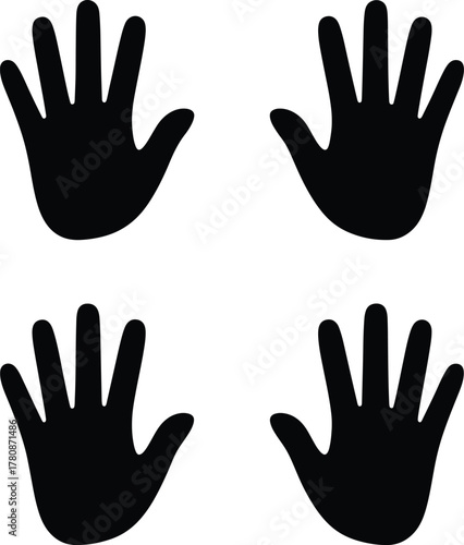 Four black handprints isolated on a white background conceptual image