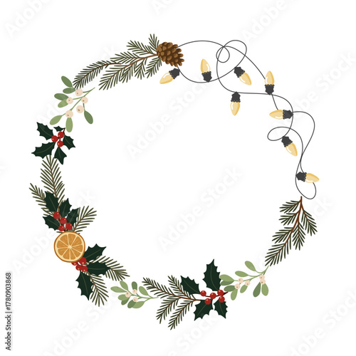 Świąteczna ramka wianek z gałązkami jodły, sosny, ostrokrzewem, jemiołą, plastrem pomarańczy, szyszką i lampkami choinkowymi.