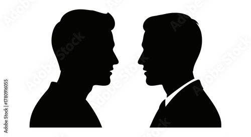 Two male silhouettes facing each other in a dark contrasting image