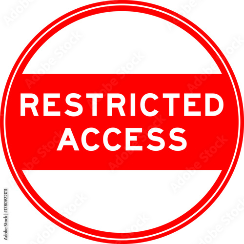Red color round seal sticker in word restricted access on white background