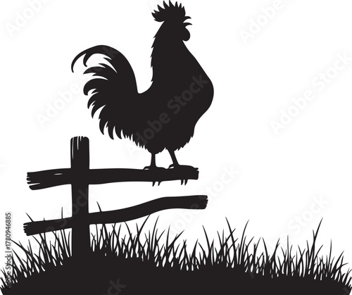 Black silhouette of a rooster perched on a wooden fence post
