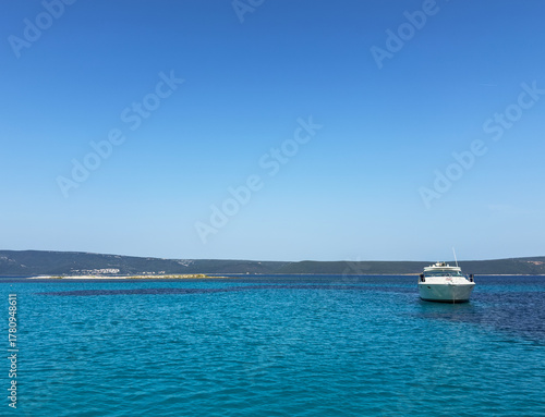 Boat on Crystal Clear Blue Waters