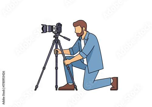 Photographer Adjusting Camera on Tripod, Kneeling Position