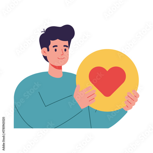 Young man holding a large heart icon and smiling cheerfully  