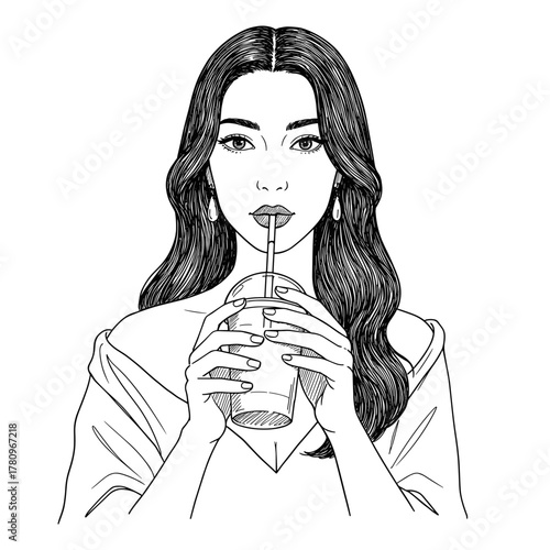 Young woman drinking iced beverage with straw in casual style  