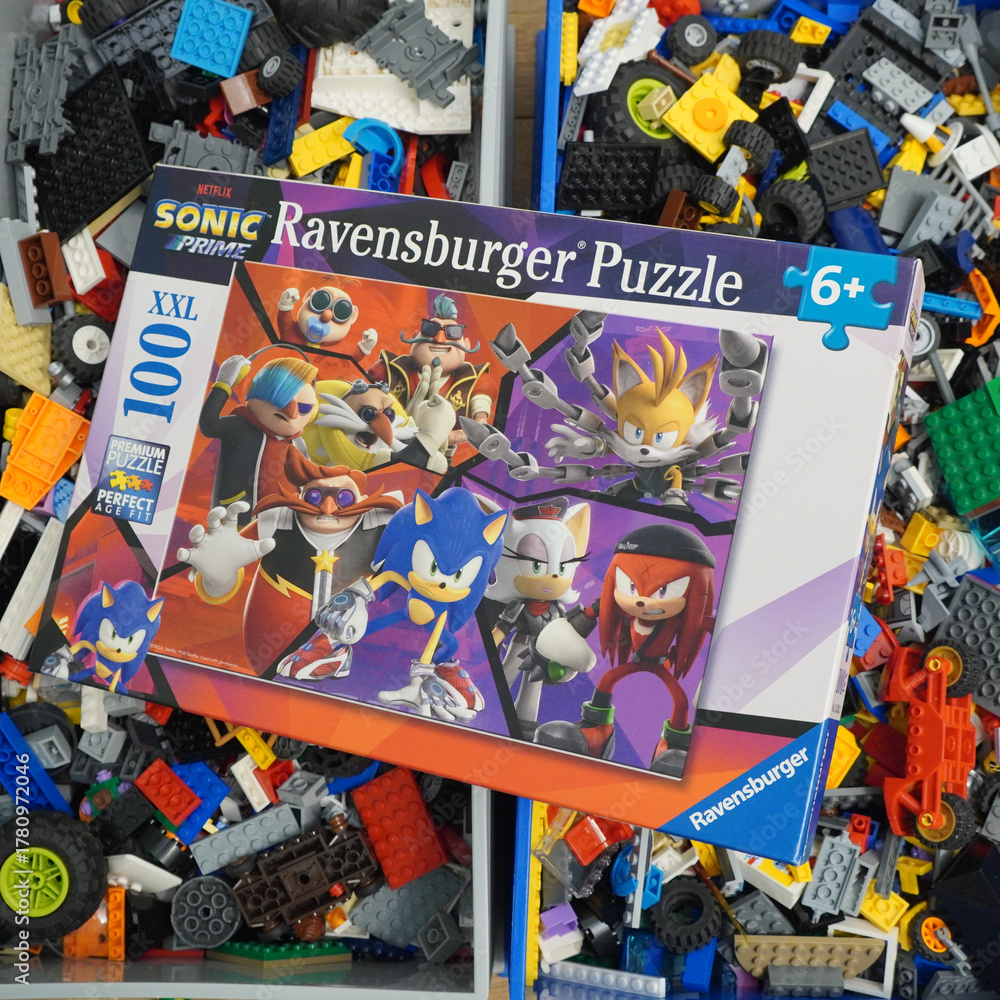 Fototapeta premium Sonic Prime puzzle box with characters and colorful Lego bricks background