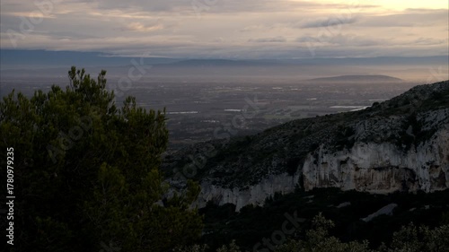 Massive rock formation in the Alpilles on a cloudy morning