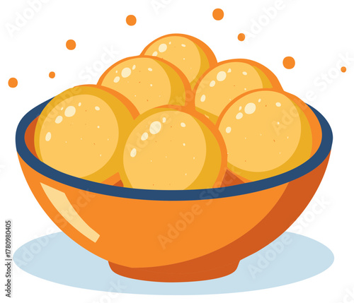 Vibrant orange bowl brimming with golden fried dough balls and sweet treats