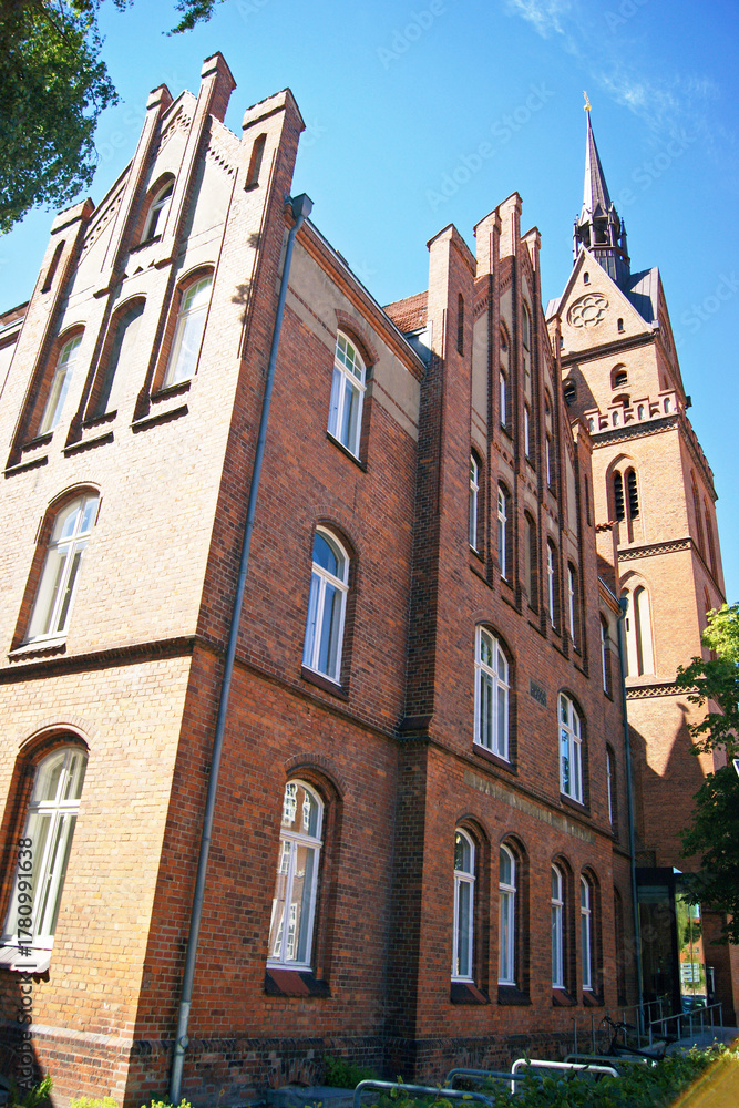 Fototapeta premium View of the Sacred Heart Church in Lübeck, Germany. Symbolizing faith, spiritual heritage, religious tourism, and the timeless beauty of sacred architecture within the historic Hanseatic cityscape.