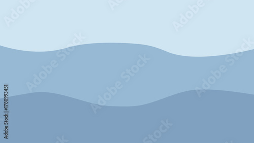 Abstract blue wave vector over a misty mountain landscape at sunrise