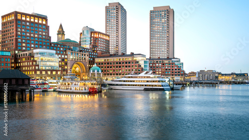 The historic architecture of Boston in Massachusetts, USA at night showcasing the Boston Harbor and Financial District.