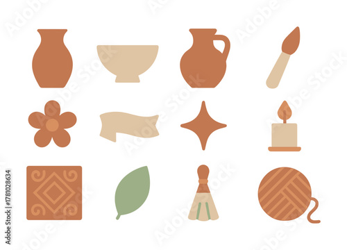 Vintage objects: pottery, candle, and art supplies in earth tones